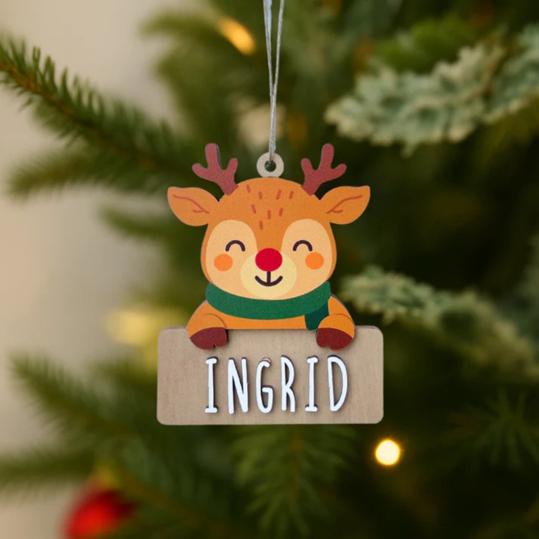 Adorno de Navidad de madera con forma de reno personalizado con nombre grabado